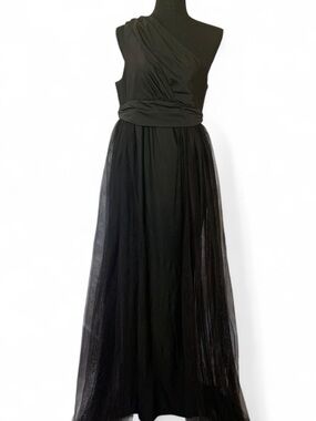 Faeriesty black evening gown with one shoulder and tulle skirt.